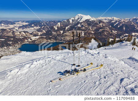Mountains skis and ski-sticks - St. Gilgen Austria 11709488