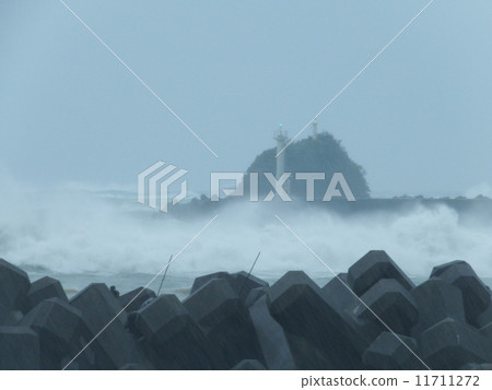 Marujima floating in high waves 11711272