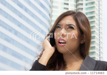 Business woman calling to connect Business woman calling to connect 11714063