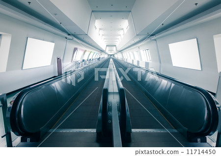 escalator in airport 11714450