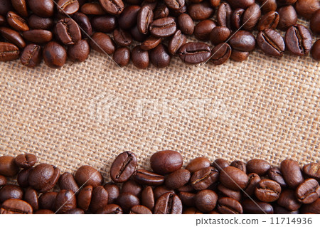 Coffee beans on linen background Coffee beans on linen background 11714936