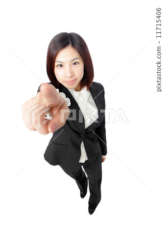attractive businesswoman pointing her finger attractive businesswoman pointing her finger 11715406