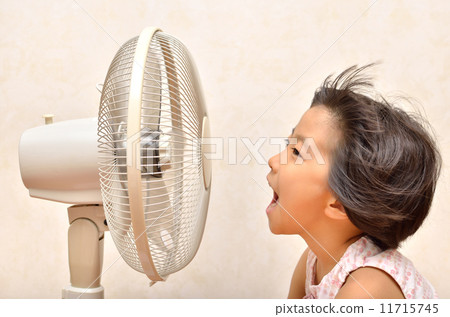 A girl cool with a fan A girl cool with a fan 11715745