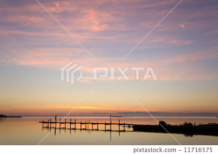Evening light over bath pier 11716575