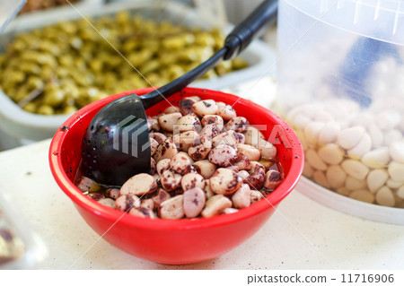 Marinated garlic and olives on provencal street market in Proven Marinated garlic and olives on provencal street market in Proven 11716906