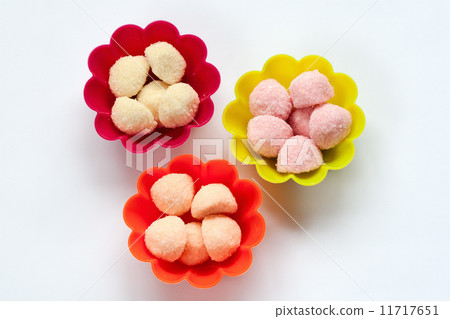 sweet jelly candies in cup cake cases on white 11717651