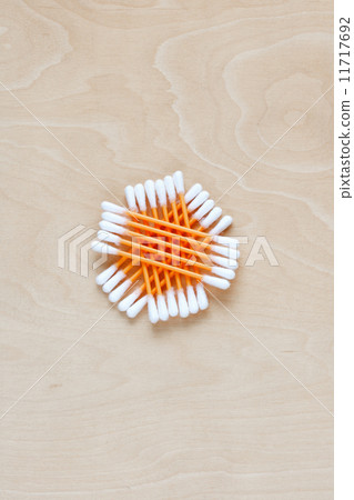 Ear sticks scattered on a table 11717692