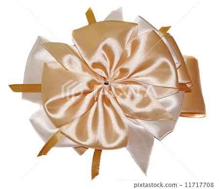 图库照片 big beautiful cream-colored bow isolated on white