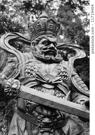 Aged asian god statue 11719404