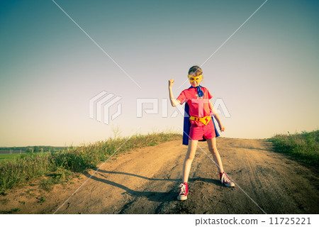 child acting like a super hero 11725221