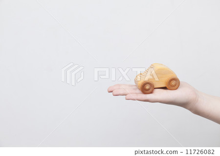 Women's hand with car toys 11726082