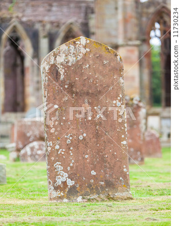 Very old gravestone in the cemetery 11730234