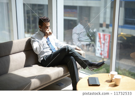 Businessman in office 11732533