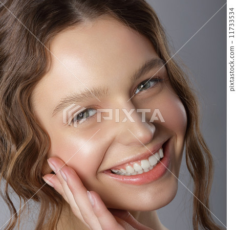 Sincere Winning Smile. Face of Happy Pleasant Young Woman 11733534