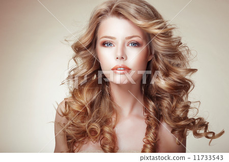 Portrait of Woman with Beautiful Flowing Bronzed Frizzy Hair Portrait of Woman with Beautiful Flowing Bronzed Frizzy Hair 11733543