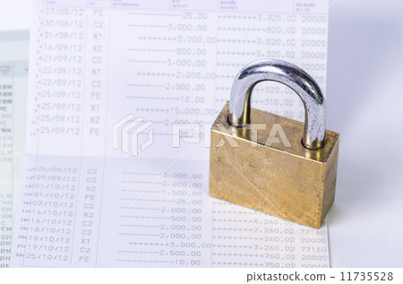 Lock and key on passbook 11735528
