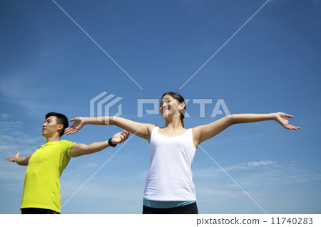 Young Asian Adults exercising Young Asian Adults exercising 11740283