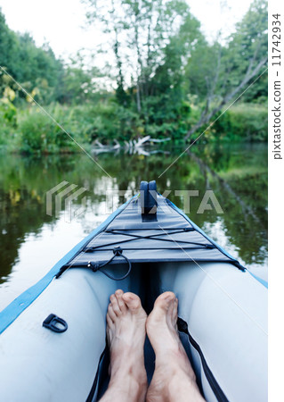 kayak on a small river kayak on a small river 11742934