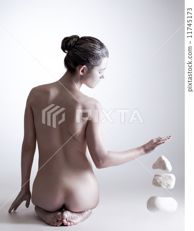 Stones attracted to hand of beautiful silver woman 11745173