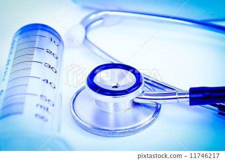 A stethoscope in front of medical 11746217