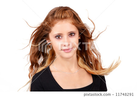Studio portrait of young beautiful girl 11748291