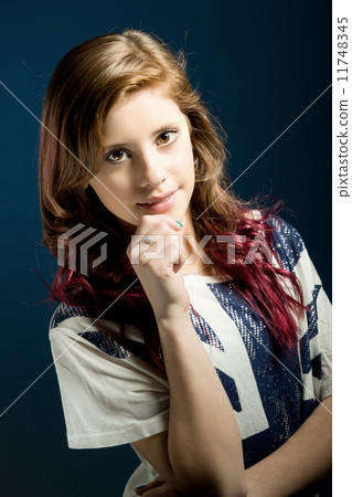 Studio portrait of young beautiful girl Studio portrait of young beautiful girl 11748345