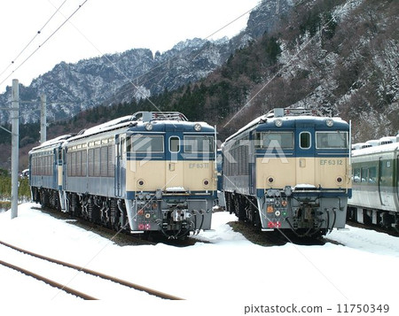 Sherpa EF63 electric locomotive on the mountain pass covered in snow 11750349