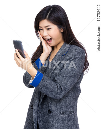 Woman surprise with text message 11752642