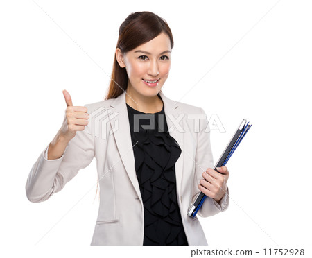 Asian businesswoman hold clipboard and laptop thump up Asian businesswoman hold clipboard and laptop thump up 11752928