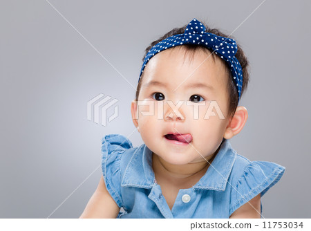 Little baby girl show tongue 11753034