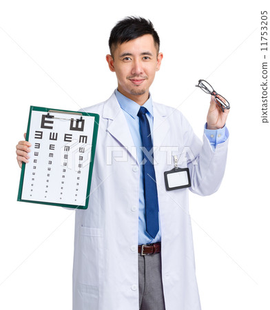 Asian oculist holding eye chart and glasses Asian oculist holding eye chart and glasses 11753205