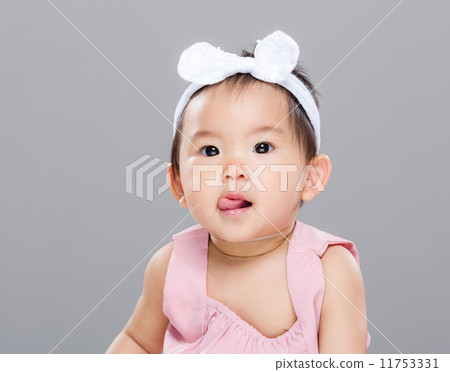 Asian baby girl show tongue Asian baby girl show tongue 11753331