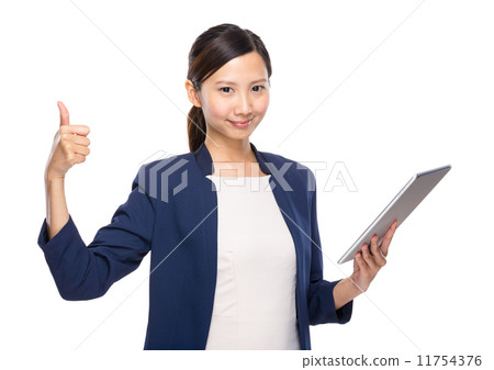 Woman thumb up with tablet 11754376
