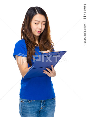 Woman write on clipboard Woman write on clipboard 11754664