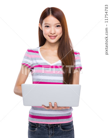 Woman type on notebook computer Woman type on notebook computer 11754783