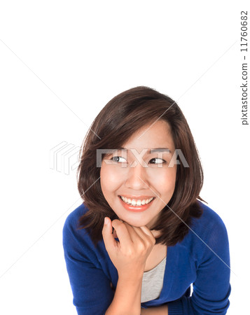 Asian woman thinking in looking pensive and happy in casual clot 11760682