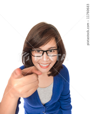 Portrait of young smiling business woman pointing finger at view Portrait of young smiling business woman pointing finger at view 11760683