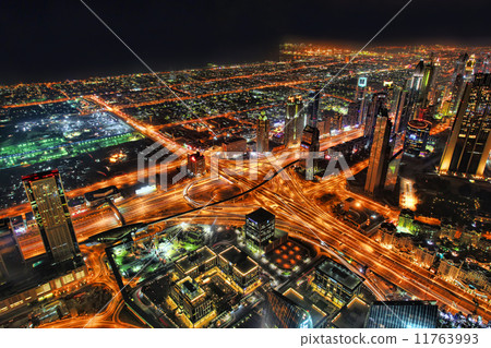 Dubai downtown night scene with city lights and roads in United Arab Emirates Dubai downtown night scene with city lights and roads in United Arab Emirates 11763993