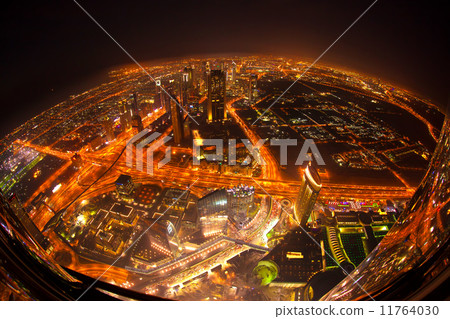 Dubai downtown night scene with city lights and roads in United Arab Emirates Dubai downtown night scene with city lights and roads in United Arab Emirates 11764030