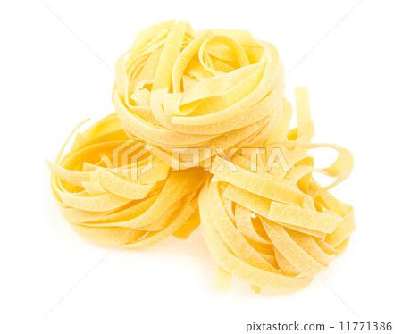 Italian pasta fettuccine nest isolated on white background Italian pasta fettuccine nest isolated on white background 11771386