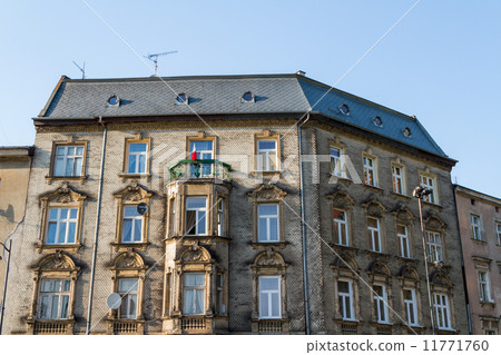 Beautiful facade of old town house in Krakow, Poland Beautiful facade of old town house in Krakow, Poland 11771760