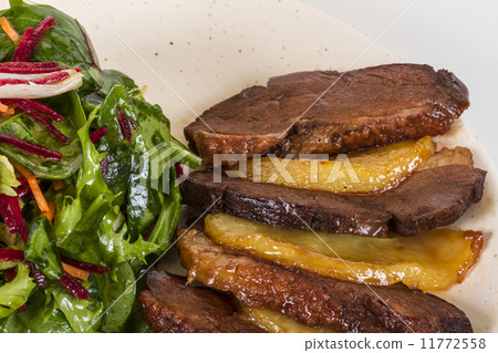 duck fillet, mashed potatoes seasoned with truffle oil, fig and 11772558