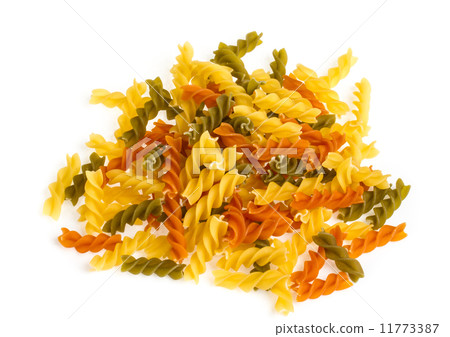 Uncooked pasta fusilli in different colours, white background Uncooked pasta fusilli in different colours, white background 11773387