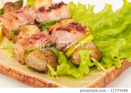 Bacon wrapped grilled Scallops with mushrooms and bacon 11774496