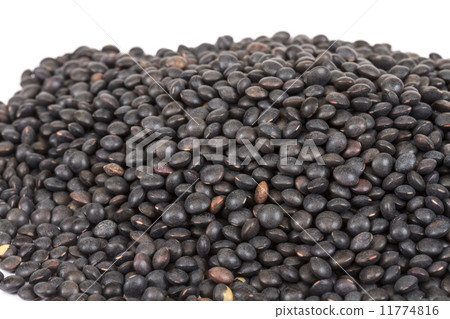 Heap of black lentil isolated on white 11774816