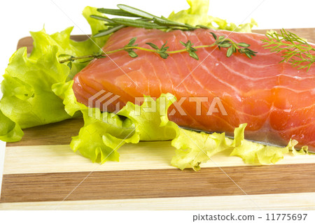 Salmon fillet garnished 11775697
