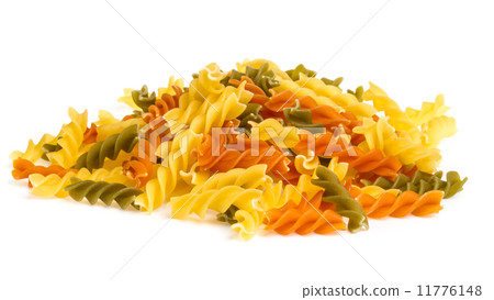 Uncooked pasta fusilli in different colours, white background Uncooked pasta fusilli in different colours, white background 11776148