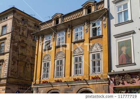 Beautiful facade of old town house in Krakow, Poland Beautiful facade of old town house in Krakow, Poland 11777719