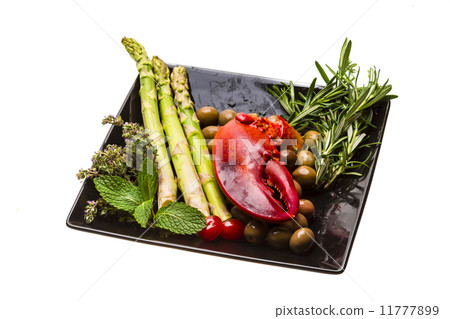 Lobster leg with salad and asparagus Lobster leg with salad and asparagus 11777899
