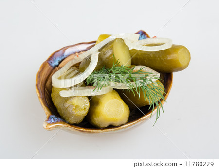 Closeup view of pickled cucmbers in a bowl 11780229